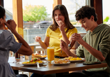 Family Eating at Denny's